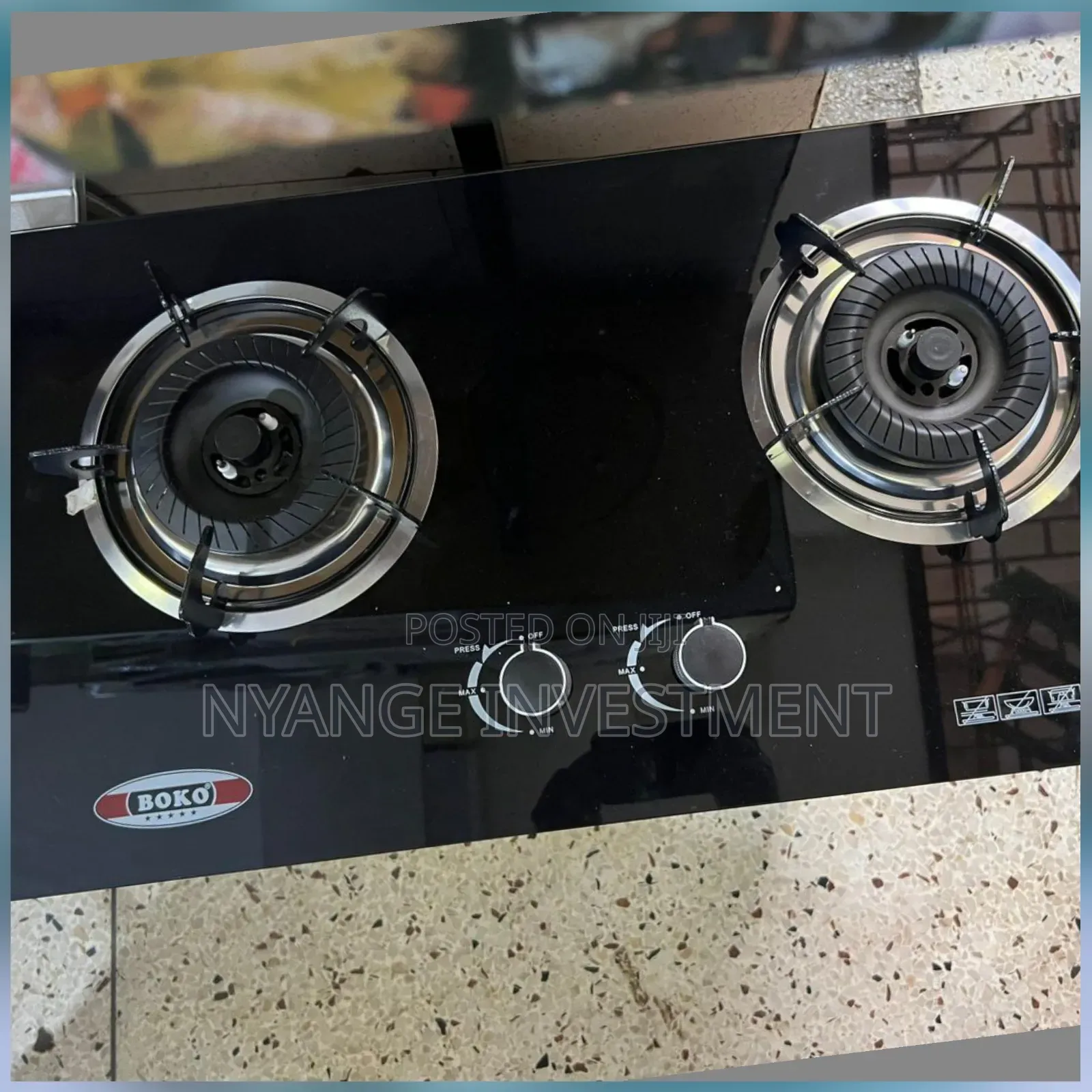 Boko Brand Gas Job With a Sleek Black Glass Top and Two Burners.