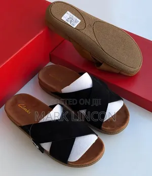 Clarks Men's Suede Slide Sandals Feature a Distinct Brown Cross-Strap