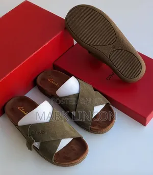 Clarks Men's Suede Slide Sandals Feature a Distinct Brown Cross-Strap