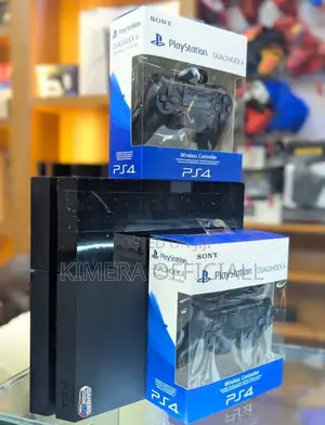Standard Ps4 and 2 Pads Console Ps4 With 12 Games. It's Chipped. Clean