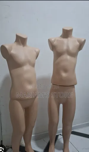 Plastic Dummy Is A Headless For Displaying Children's Clothing.