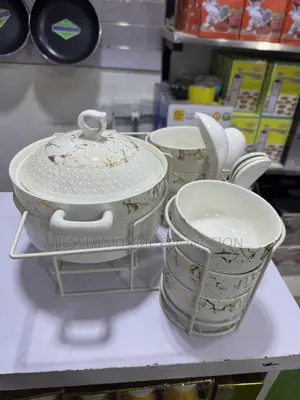 Serving Dishes With The Bowls And Serving Spoons