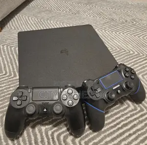 Sony Playstation 4 1tb With 5 Games and 2 Controllers- Japan Used