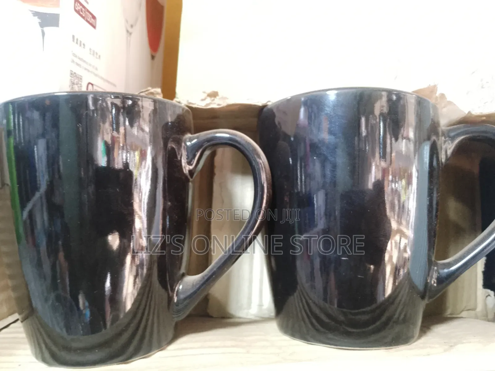 A Set of 6 Glossy Black Ceramic Coffee Mugs