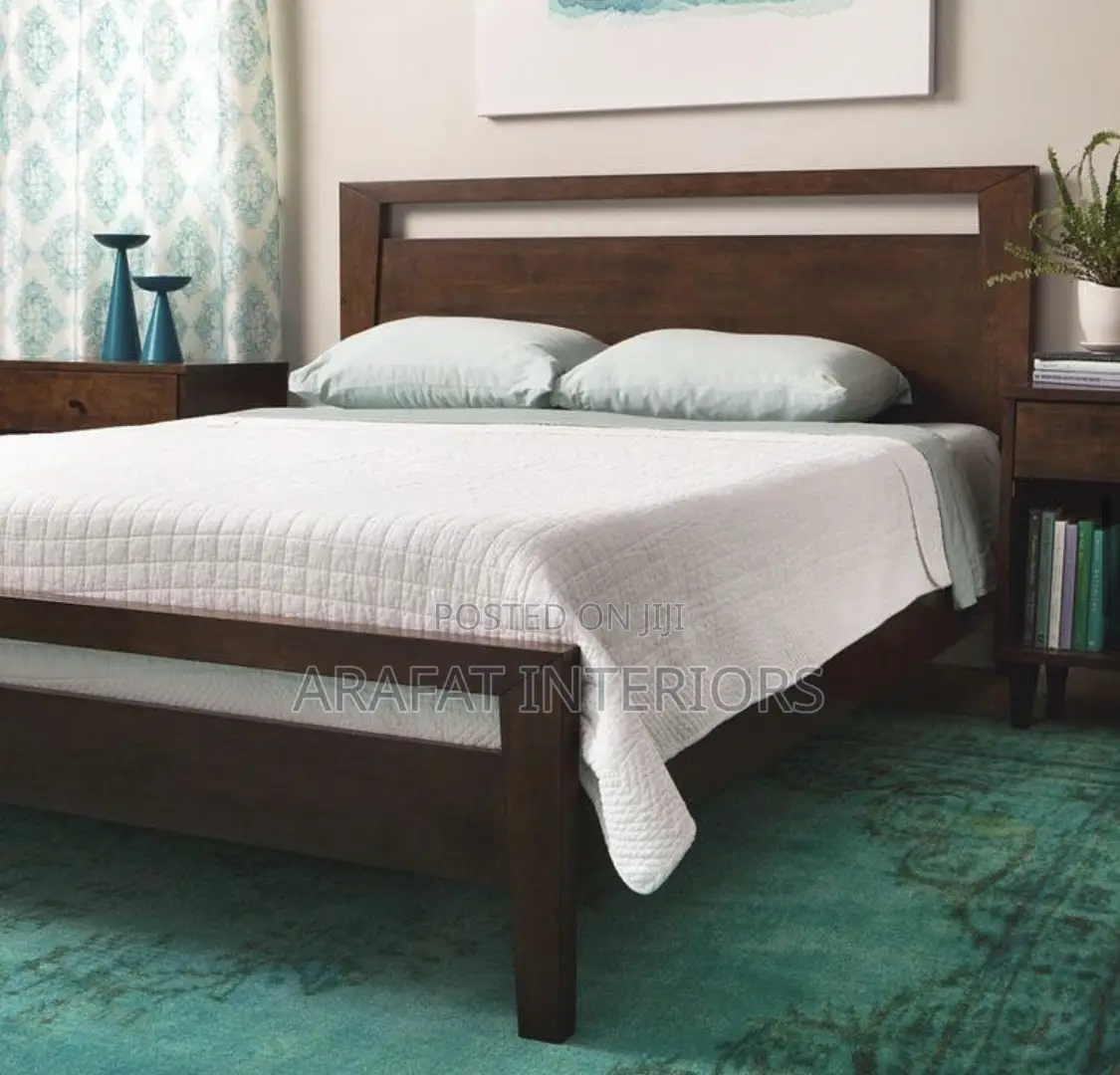 Simple, Warm, and Timeless  This Dark Walnut Bed
