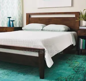 Simple, Warm, and Timeless  This Dark Walnut Bed