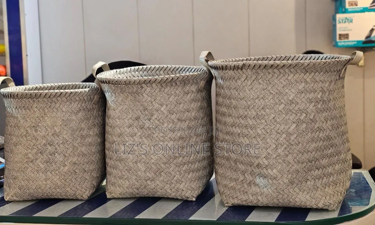 Woven Storage Baskets Come As 3-piece Set And Feature Sturdy Handles.