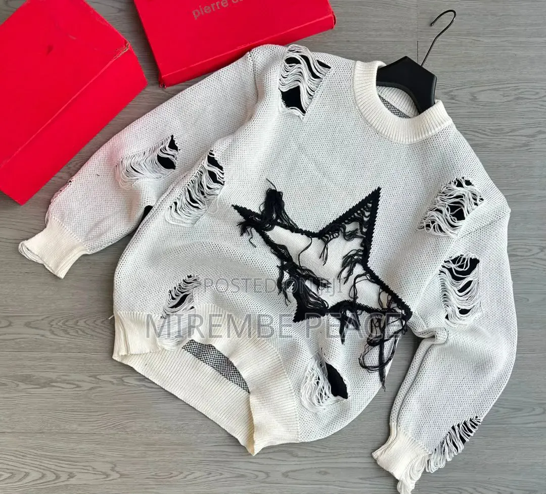 Distressed Knitted Sweaters