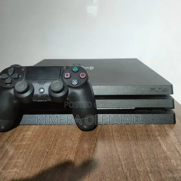Ps4 Pro Chipped With 12 Games and 2 Controllers. Very Clean Nearly New