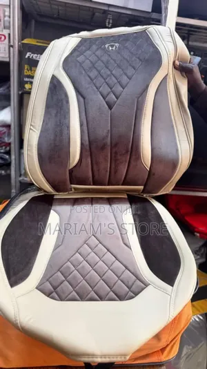 Black Leather Seat Cover Features a Diamond-Quilted Pattern]