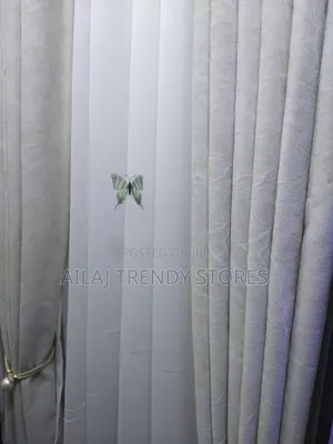 Light Cream Curtains and White Nets Per Metre