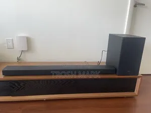 Samsung Sound Bar With a Subwoofer and It's Remote Fully Functional