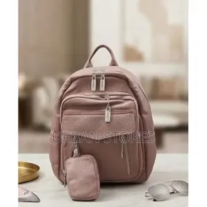 Ladies Back Pack With a Small Handle Bag