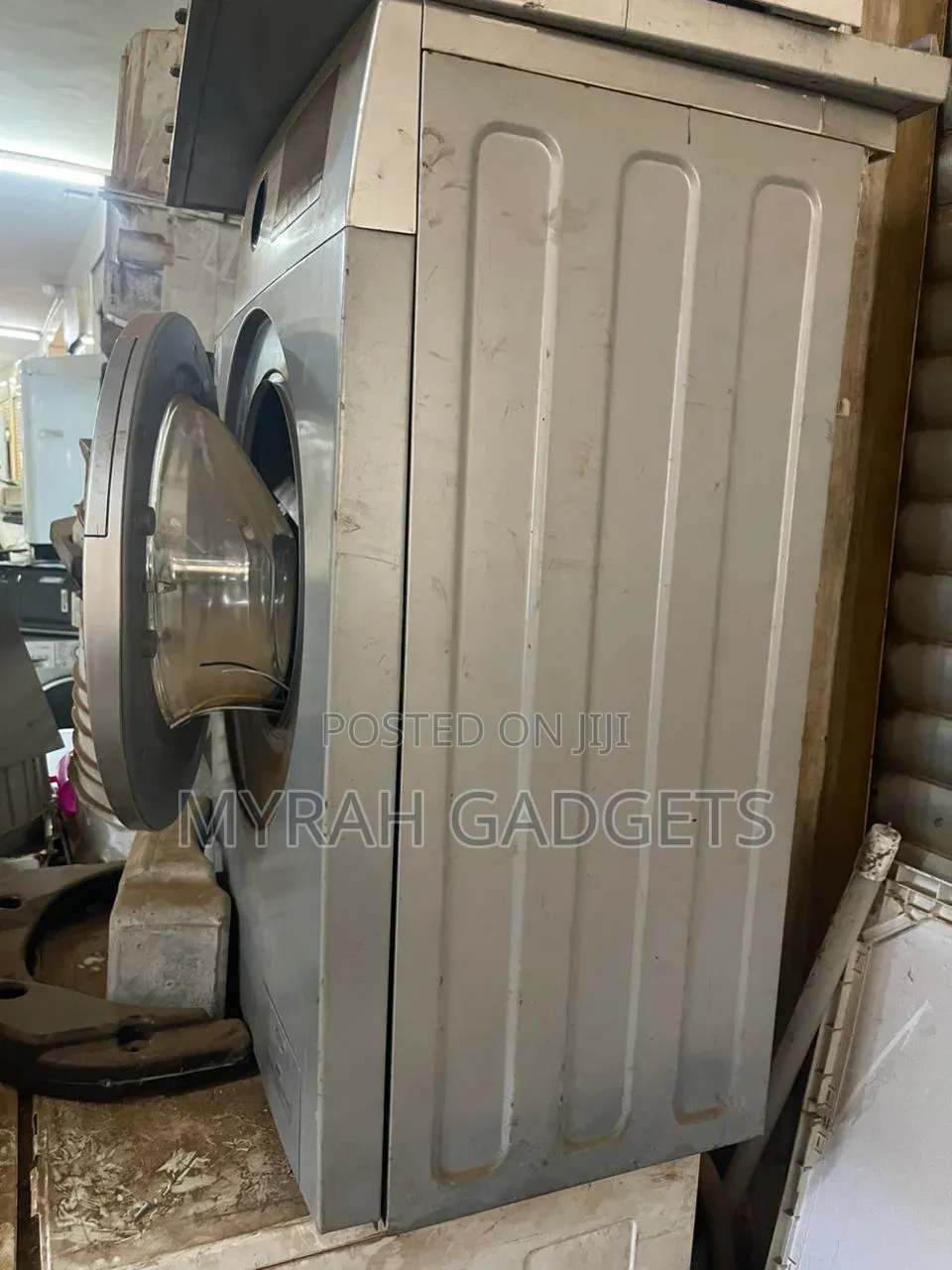 Repair of a Silver Front-Load Washing Machine