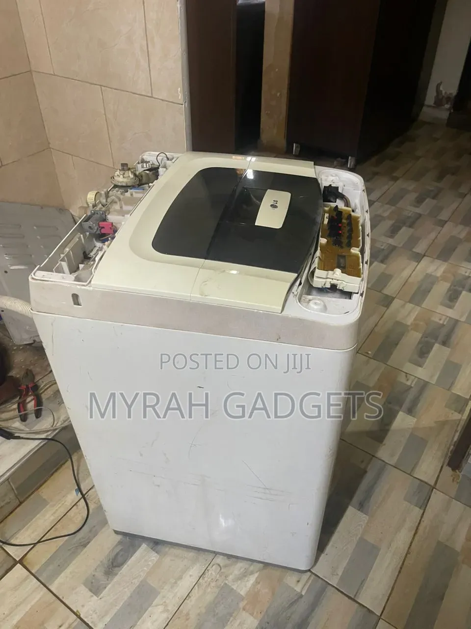 Repair of Lg Top-Loading Washing Machine Partially