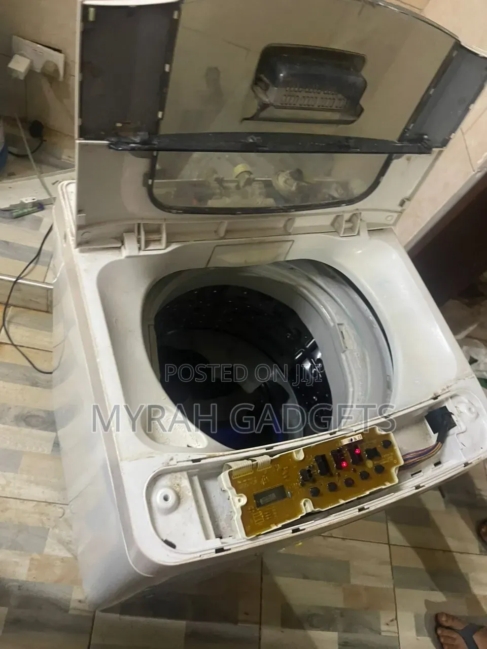 Repair of Lg Top-Loading Washing Machine Partially