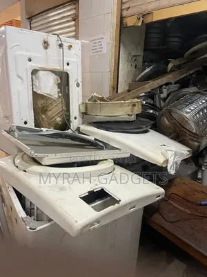 Heavily Disassembled Top-Loading Washing Machine