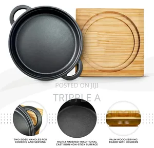Cast Iron Sizzler Pan With a Wooden Serving Board