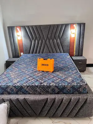 Gray Fabric Lined Bed