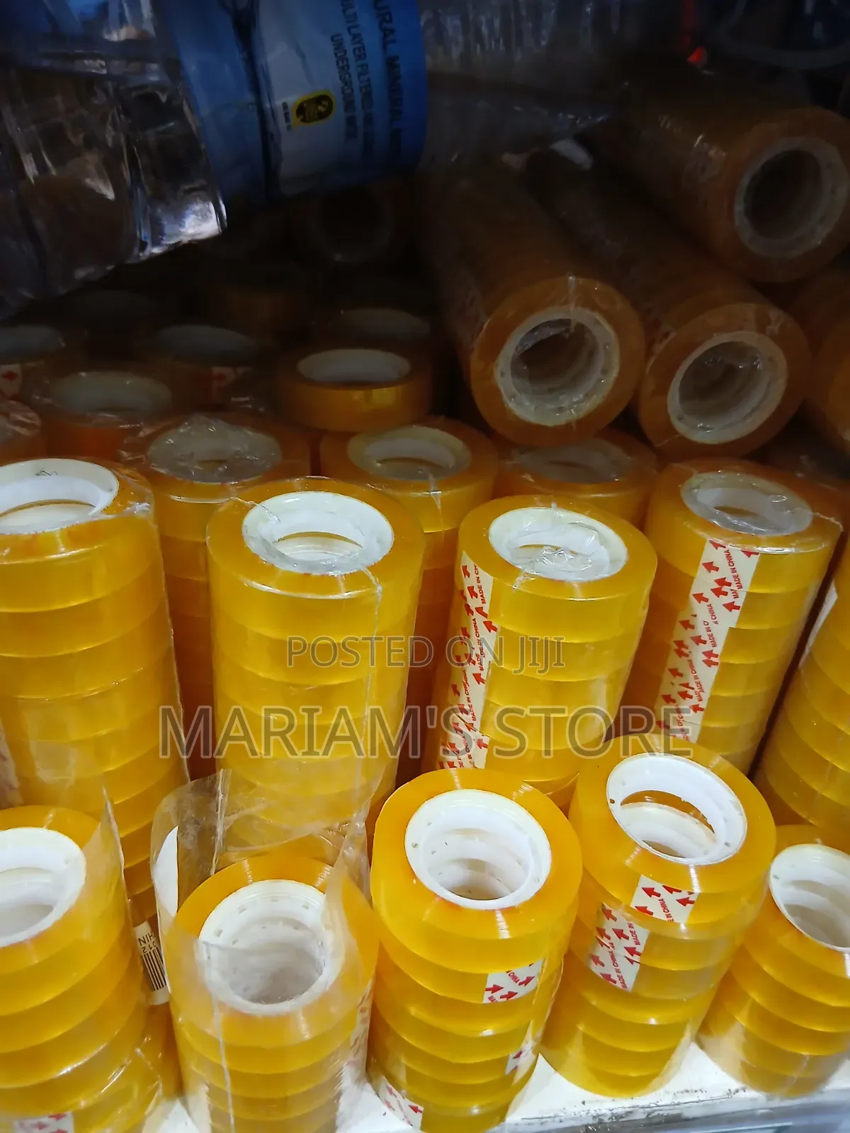 Yellow Sealing Tape Rolls, Often Used for Packaging and Office Tasks.