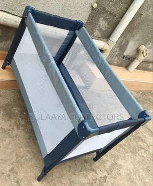 Uk Used Blue And Grey Travel Cot/ Bed/ Crib.