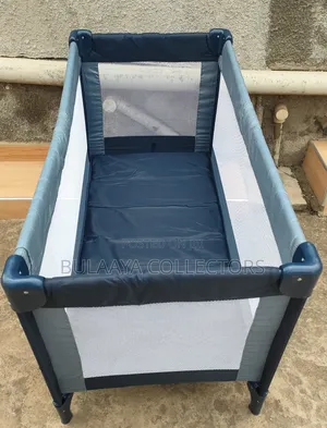 Uk Used Blue And Grey Travel Cot/ Bed/ Crib.