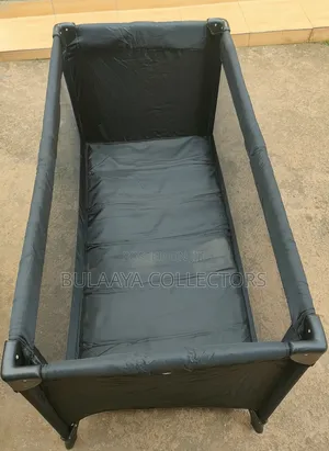 Uk Used Black Jollymex Travel Cot/Playpen/Bed/Crib.
