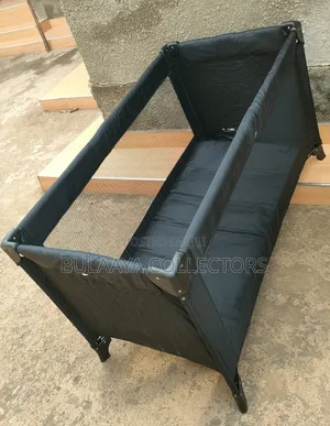 Uk Used Black Jollymex Travel Cot/Playpen/Bed/Crib.