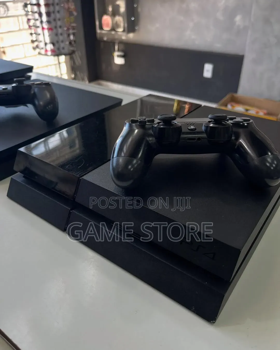 Sony Playstation 4. Comes With 12 Games and 2 Controllers