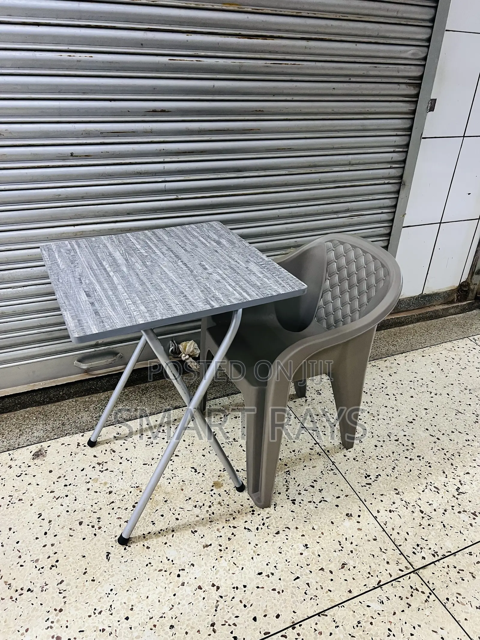 Reading Foldable Table and a Plastic Chair