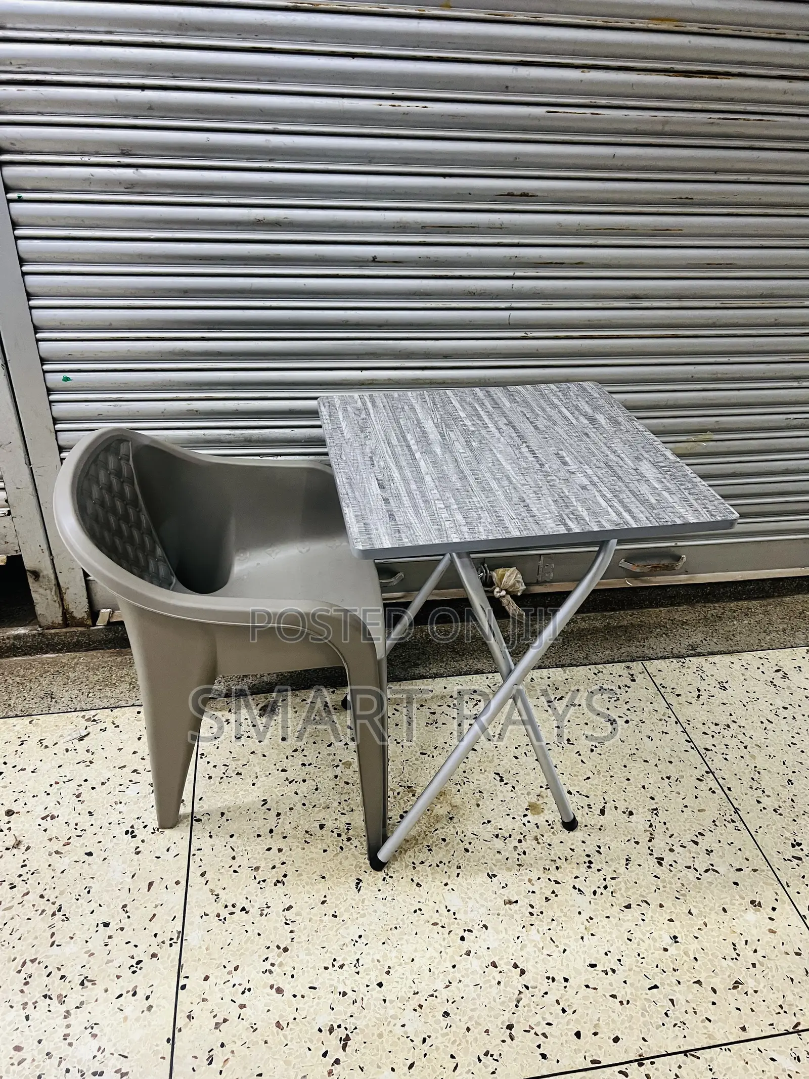 Reading Foldable Table and a Plastic Chair