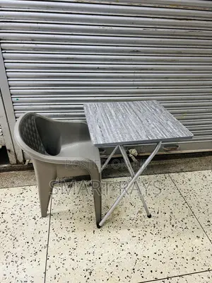 Reading Foldable Table and a Plastic Chair