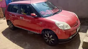 Mazda Verisa 2011 Red