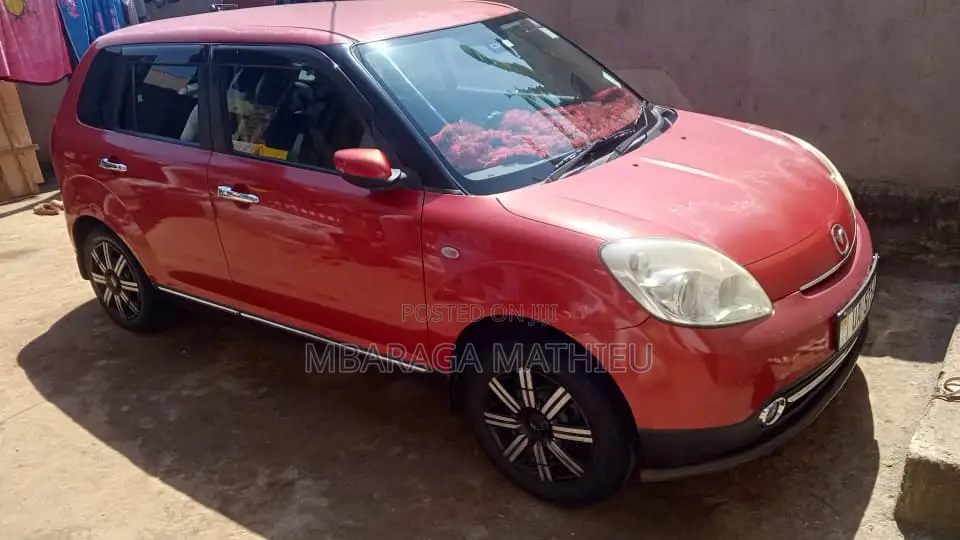 Mazda Verisa 2011 Red