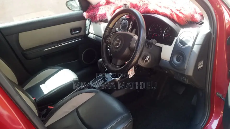 Mazda Verisa 2011 Red