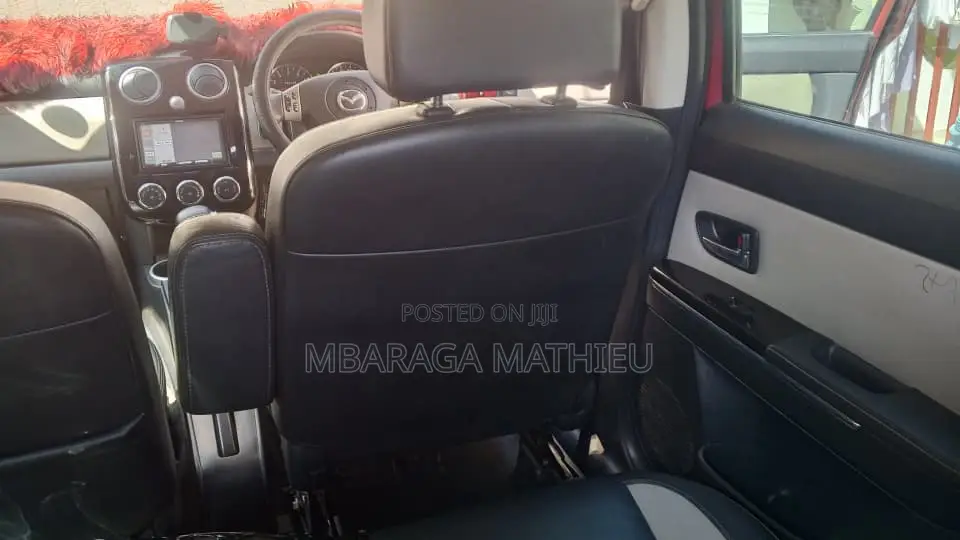 Mazda Verisa 2011 Red