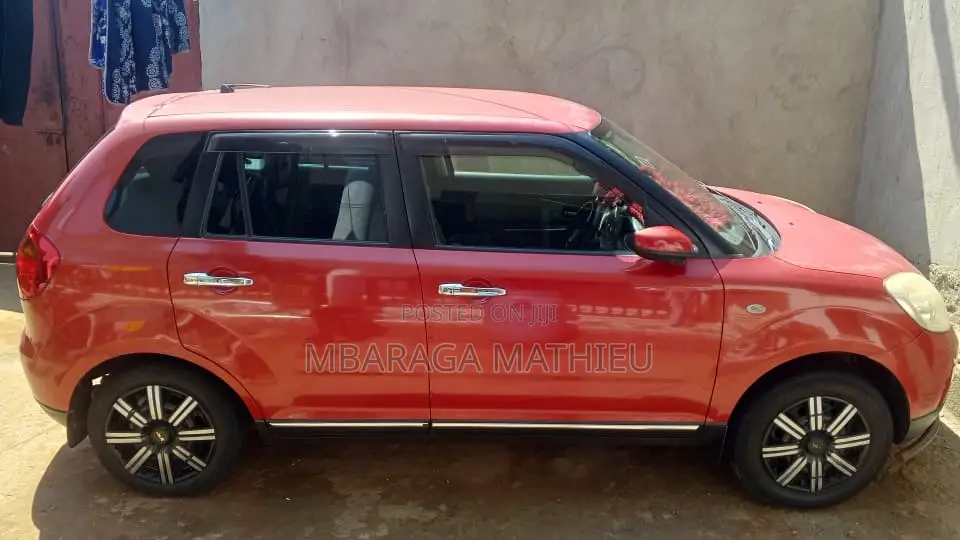 Mazda Verisa 2011 Red