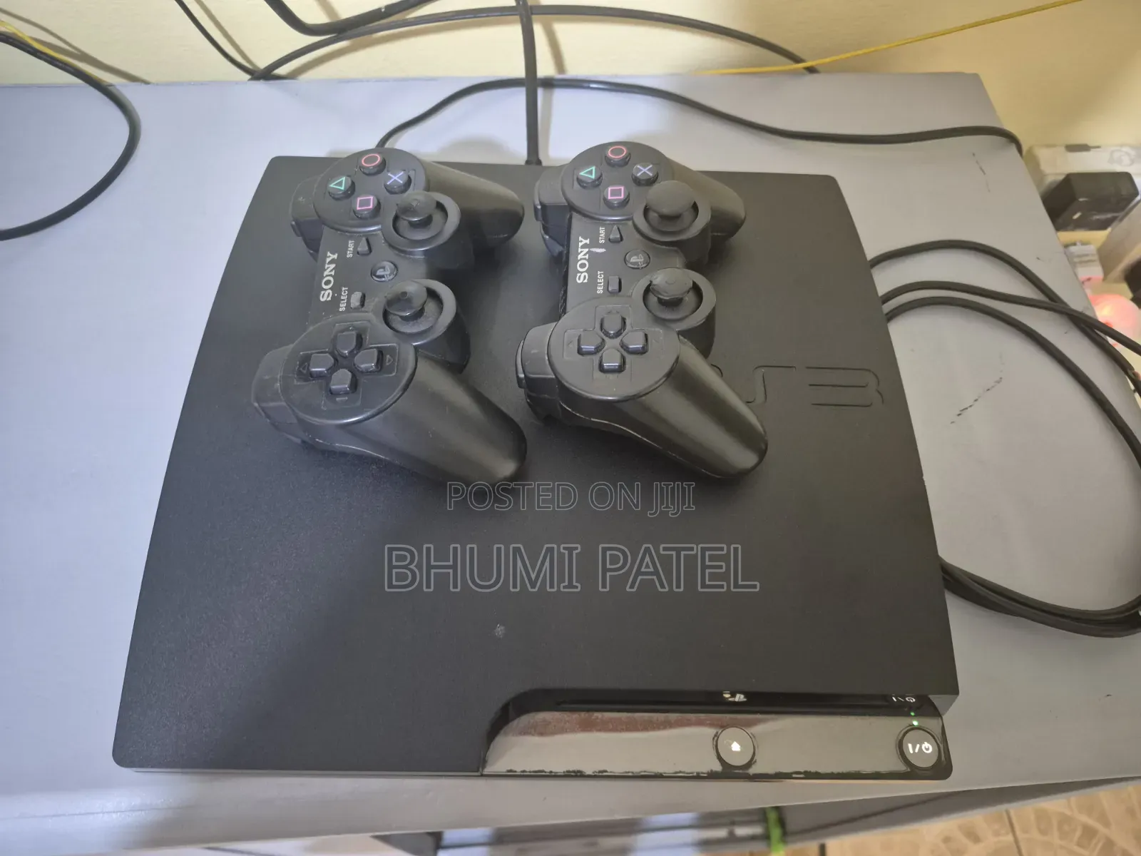 Ps 3 Slim With 2 Controllers,7 Games and Charger