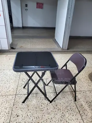Folding Glass Table and a Folding Leather Chair