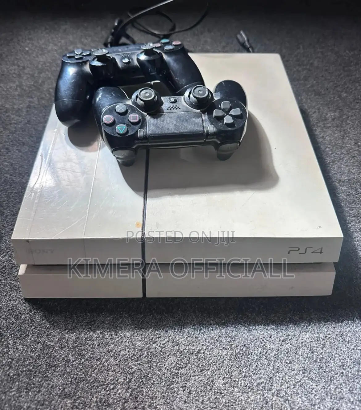 Ps4 Standard With 12 Games, 2pads. Like Kampala, Never Sleeps Too.