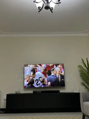 TCL 65inch Android Tv , Uhd Brand New With 3years Warranty,