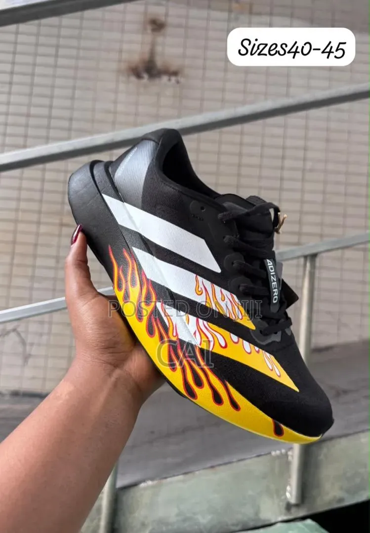 Adidas Adizero EvoBlack and White With a Flame Graphic Pattern