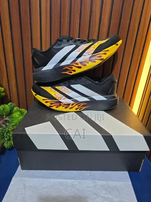Adidas Adizero EvoBlack and White With a Flame Graphic Pattern
