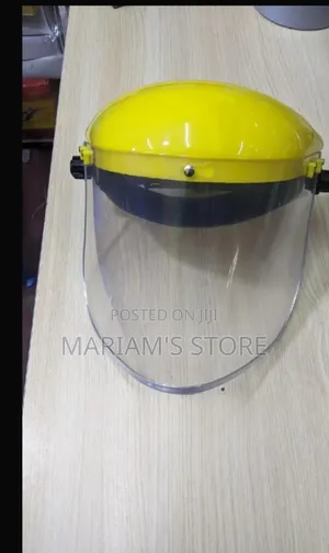 Industrial Safety Face Shield With a Bright Yellow Brow Guard .