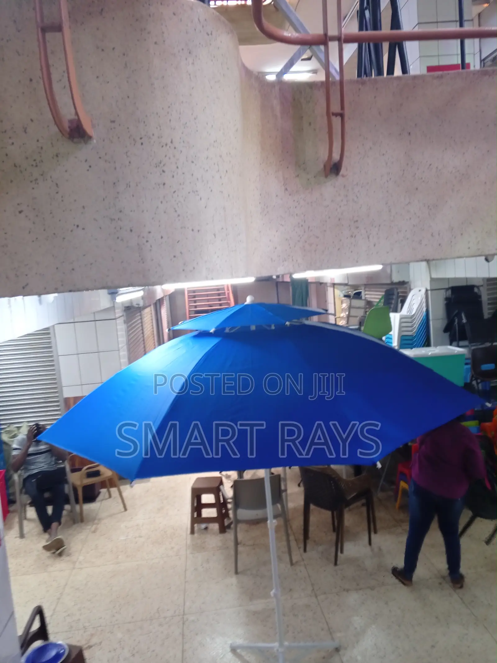 Round Topped Umbrella With a Stand