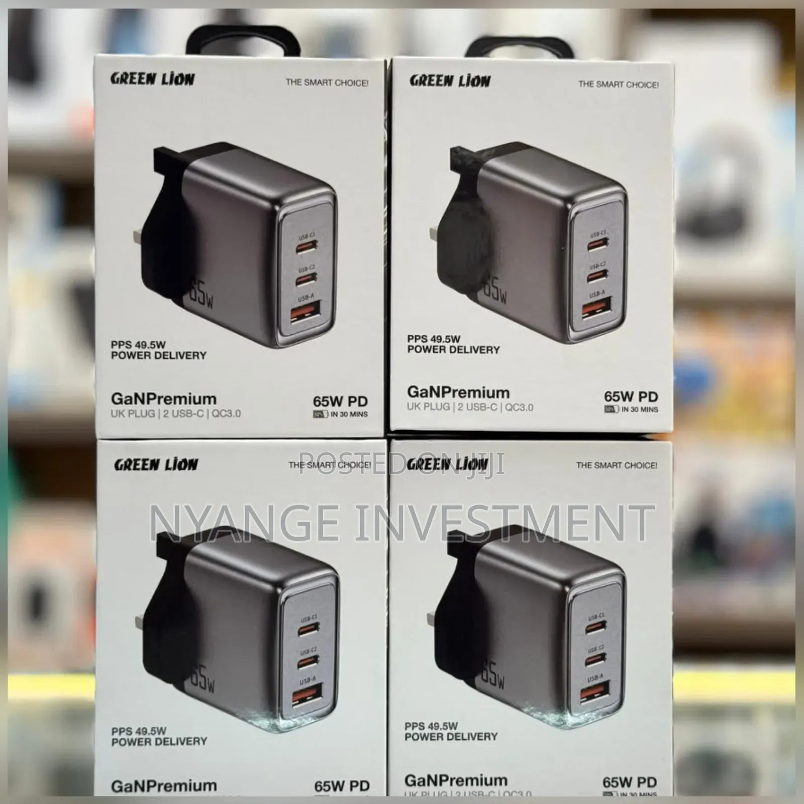 Green Lion GaN Premium Charger With 65W Power Delivery and a UK Plug.