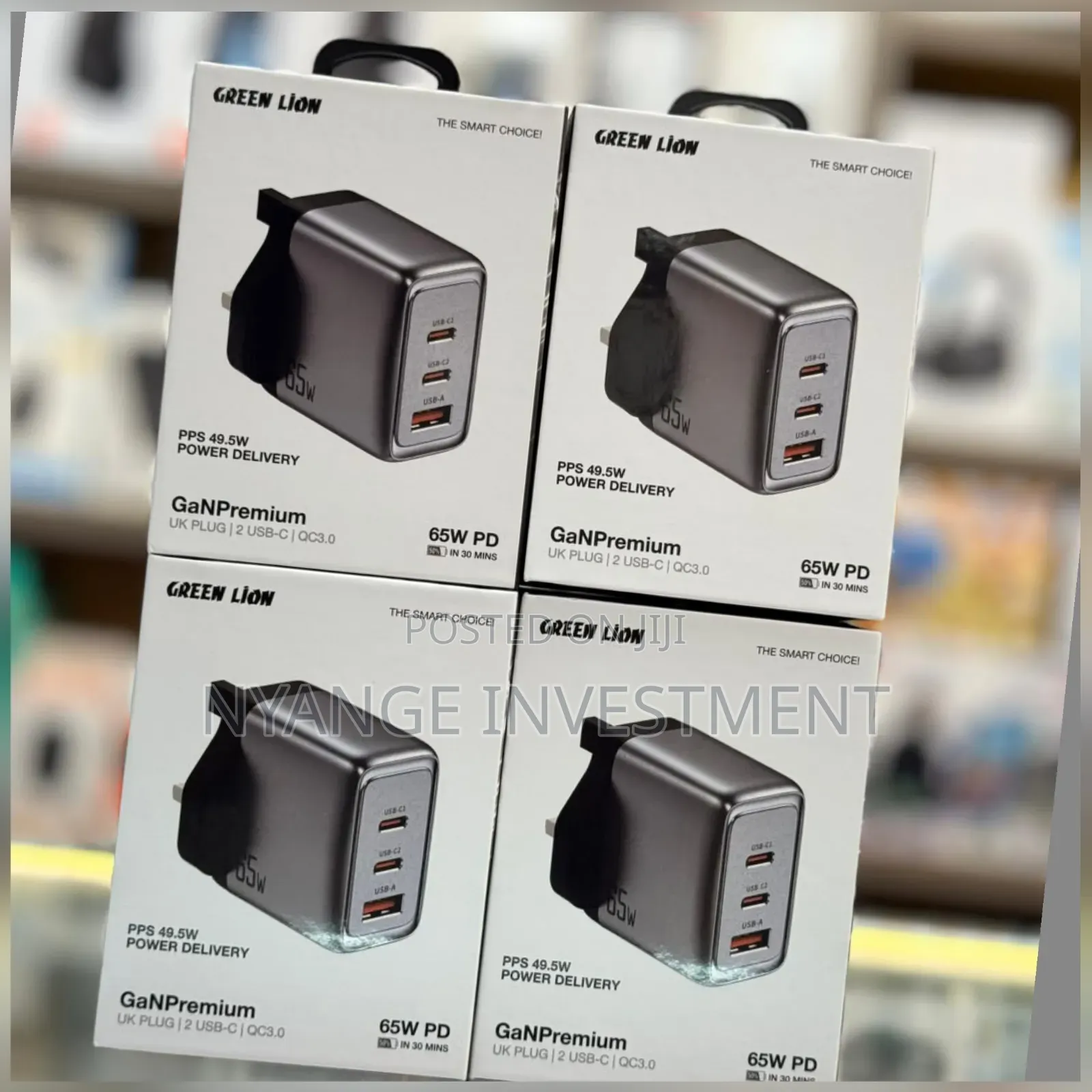 Green Lion GaN Premium Charger With 65W Power Delivery and a UK Plug.