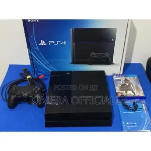 PS4 Standard With 12 Games, 2pads. Even the KCCA Man Is Looking.
