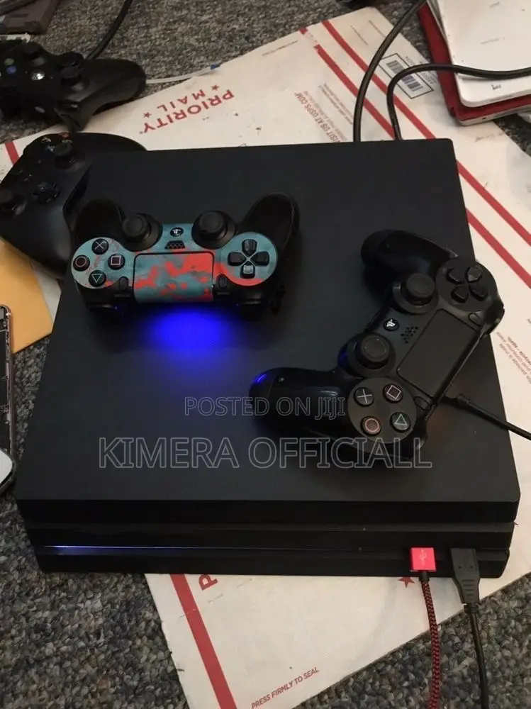 PS4 Pro With 12 Games, 2pads. Make Your Ex Jealous Today.