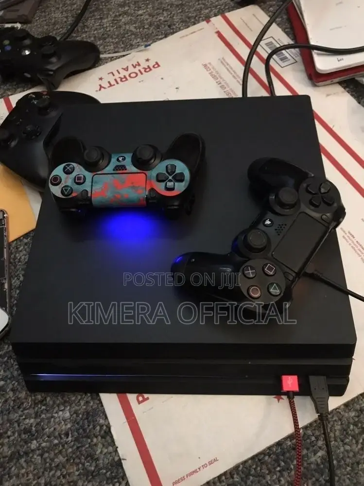 PS4 Pro With 12 Games, 2pads. Make Your Ex Jealous Today.
